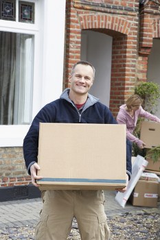 Moving van and packed boxes for removals in Twickenham