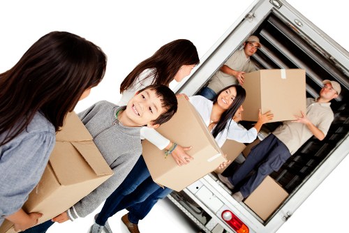 Removal team packing and loading household items for a Twickenham move