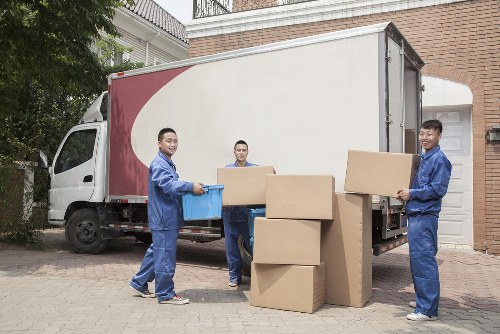House removals planning in Twickenham with moving boxes and a van
