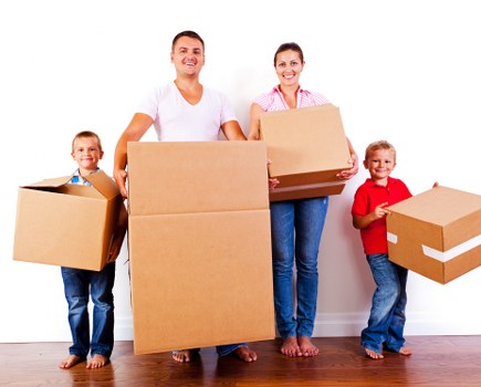 Moving boxes and a removal van during a home move in Twickenham