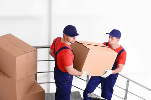 Professional movers loading furniture during a Twickenham removal