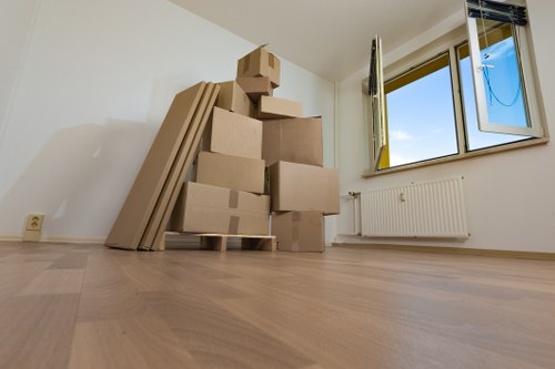 Charity donation boxes and reusable furniture prepared after a move