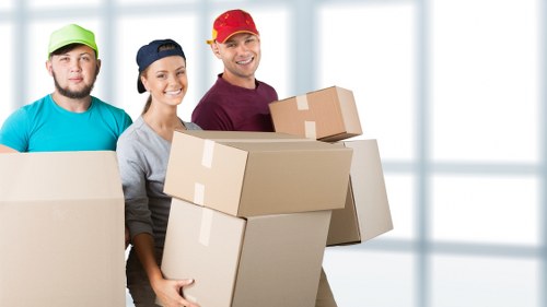 Professional movers handling furniture during a Twickenham relocation