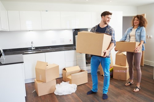 Relocation team handling boxes during removals in Twickenham