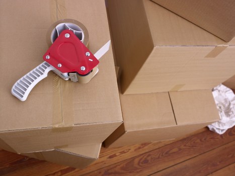 Professional movers handling fragile items during a Twickenham move